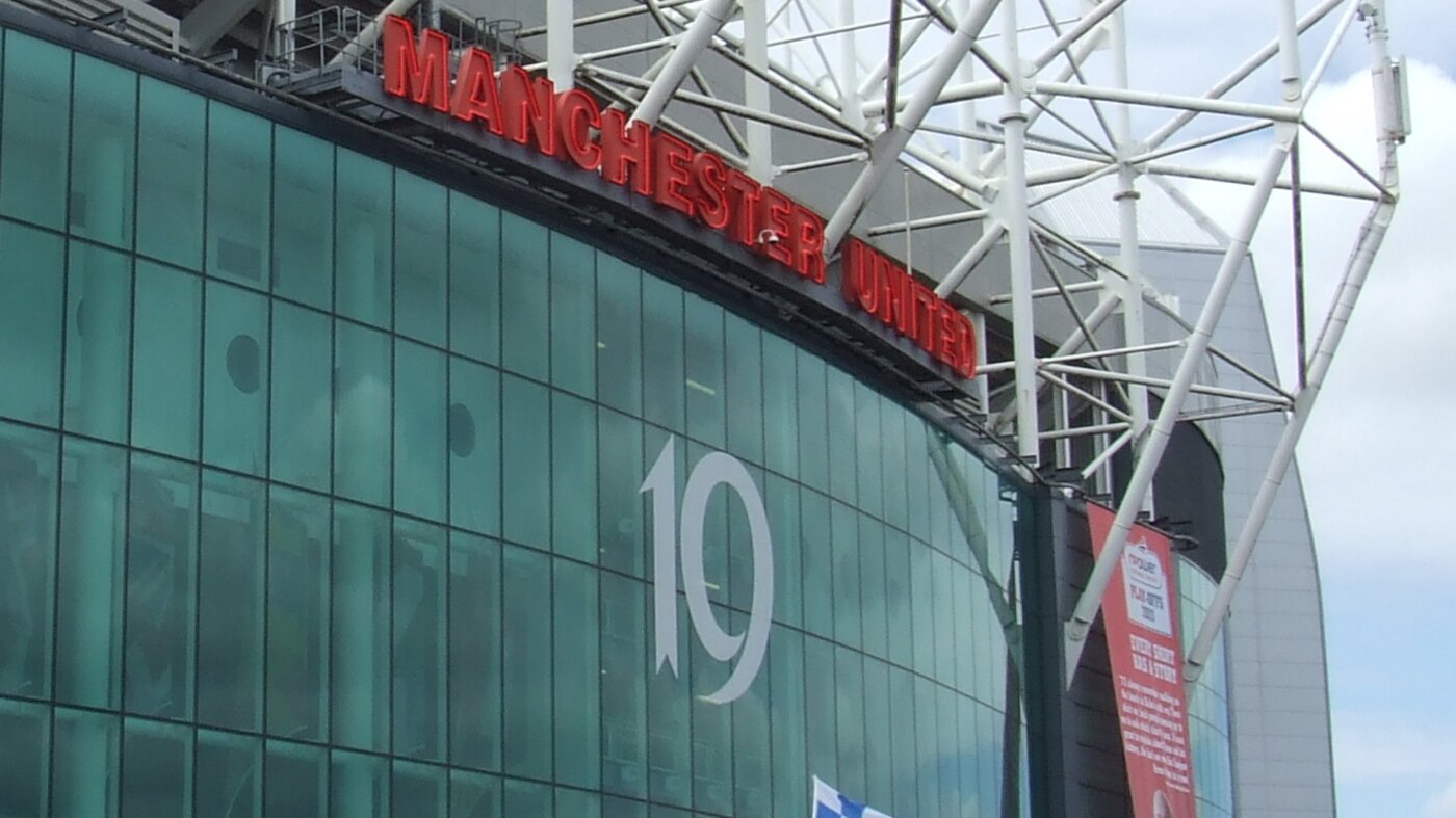 Manchester United sign at Old Trafford, where the United team news affects Saturday's match