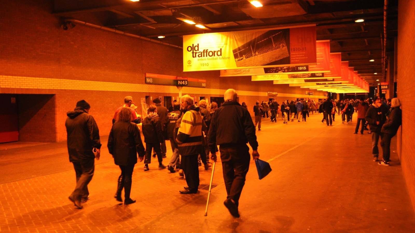 Fans walking through the Old Trafford concourse ahead of the Man United injury news update